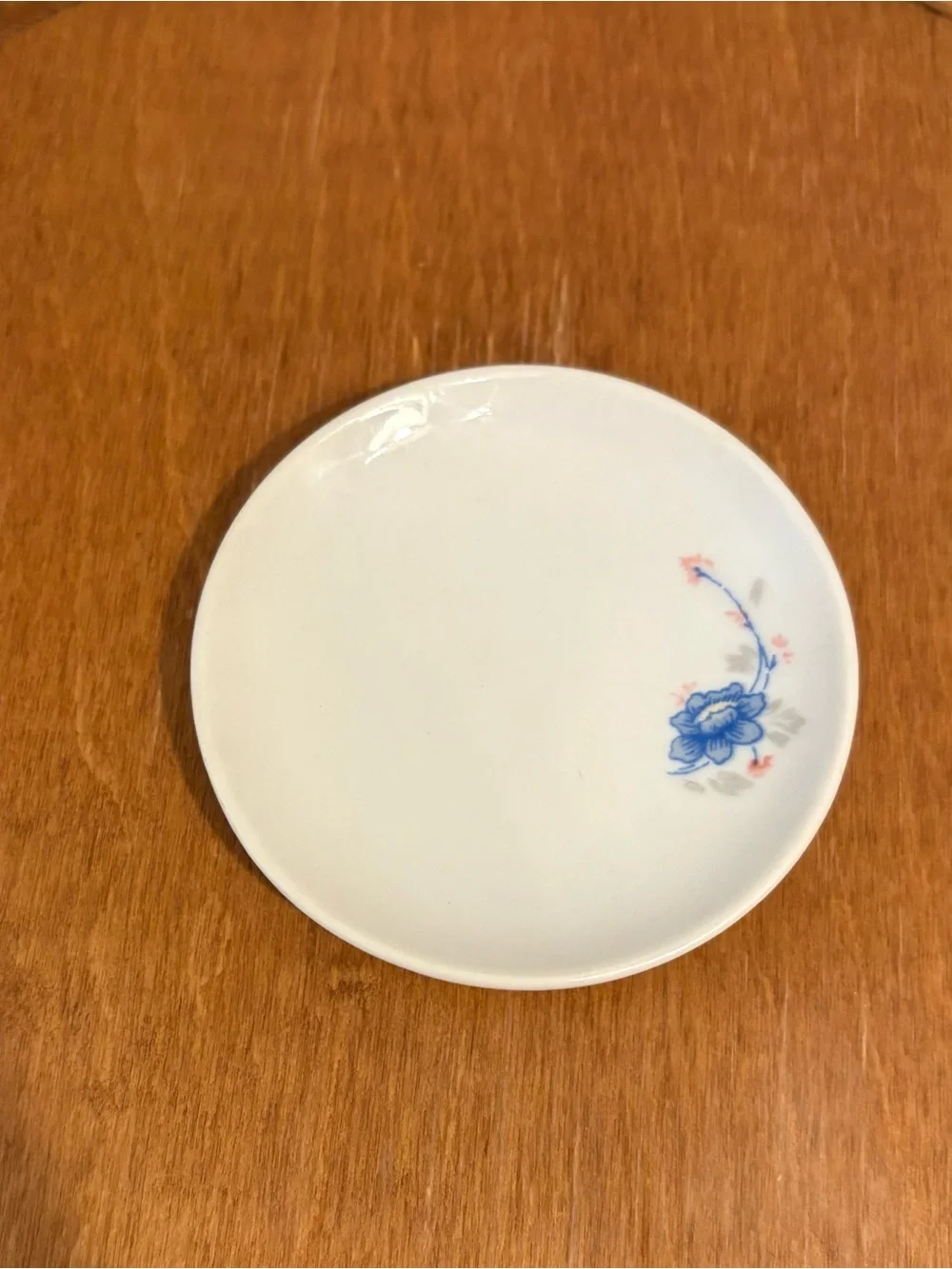Butter Pat White with Blue Floral Accent